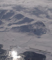 Aerial photo over Ny-Ålesund with Zeppelin Mountain in the background